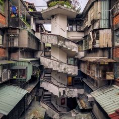 an old building with lots of windows and balconies