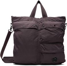 Water-resistant and piece-dyed nylon taffeta tote in purple. · Fixed carry handles · Adjustable and detachable crossbody strap · Acetate lens at face · Flap pockets, zip pocket, and patch pocket · Zip closure · Zip pocket at interior · Canvas lining · H18.5 x W19.5 x D0.75 Supplier color: Boulevard Nylon Tote Shoulder Bag With Multiple Pockets, Nylon Shoulder Tote Bag With Multiple Pockets, Purple Nylon Bags For Outdoor Use, Purple Nylon Bag For Outdoor Use, Purple Nylon Bag For Outdoor, Nylon Shoulder Bag With Double Handles And Pockets, Brown Nylon Shoulder Bag With Pockets, Purple Nylon Bags, Brown Nylon Bags With Functional Pockets