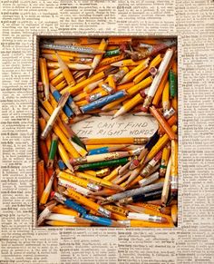 an old newspaper with some crayons in it