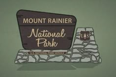 the national park sign is made out of stone