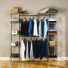 an organized closet with clothes and shoes