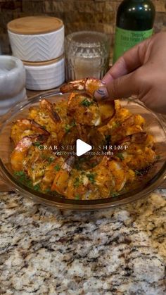 a person is placing food in a bowl