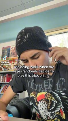 a man sitting at a table with a laptop computer in front of him and the caption reads, me doing work when my eyes randomly decided to play this trick on