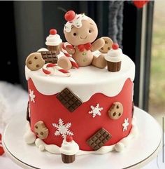 there is a cake decorated with teddy bears on the top and snowflakes on the bottom