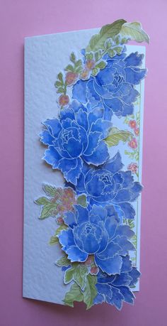 a card with blue flowers on it