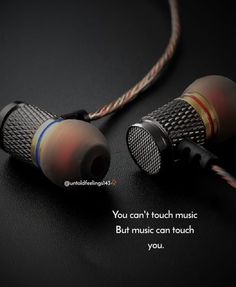 there are two earphones on the table with a quote above it that says, you can't touch music but music can touch you