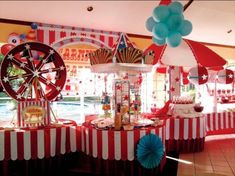 a carnival themed birthday party with balloons and decorations