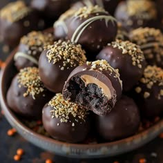 chocolate covered candies in a bowl with sprinkles