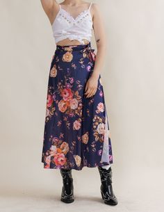 SUPER CUTE DARK BLUE FLORAL MAXI SKIRT SIZE S-M, as it can be adjusted by your liking SIZE ON LABEL no label BRAND no brand/handmade MATERIAL no label/unknown MADE IN unknown Model usually wears size S/M and is 168cm tall.  Great condition, keep in mind that it is used item and signs of natural wear/age might appear, check pictures for more. If you have any questions about item don't hesitate to message us. When buying from HungerVintage you support small sustainable business.  Thank you! Blue Fitted Wrap Skirt For Casual Wear, Blue Floral Print Long Skirt, Blue Flowy Lined Wrap Skirt, Blue Asymmetrical Flowy Wrap Skirt, Flowy Blue Wrap Skirt, Blue High-waist Floral Print Skirt, Blue Flared Flowy Wrap Skirt, Blue Flowy Flared Wrap Skirt, Blue Floral Print Relaxed Skirt