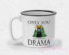 a white coffee mug with an image of a bear wearing a sombrero and the words only you can prevent drama