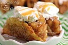 apple pie tarts with whipped cream on top