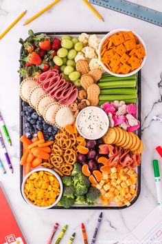 a tray filled with different types of snacks