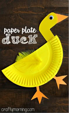 paper plate duck craft for kids on a wooden table with text overlay that reads, paper plate duck