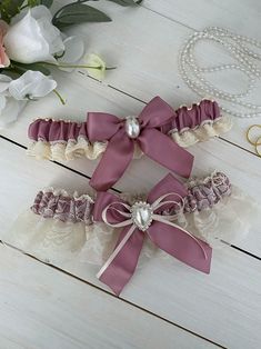 Ivory Lace Wedding Garter, Ivory Garter Set, Wedding Bridal Garter, Garter for Bride, Ivory Garter, Lace Garter Set, Rosie Mauve Garter Set Beautiful garter in ivory lace with rosie mauve satin ribbon and pearl accent Sale is final, but 100% satisfaction guaranteed. Please contact us if there are any issues with your purchase. Garter Set Wedding, Batman Wedding, Garter Lace, Lace Garter Set, Skull Wedding Ring, Wedding Garter Lace, Skull Wedding, Wedding Garter Set, Goth Wedding