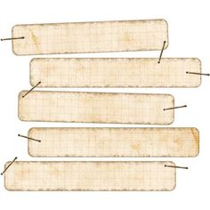 four old paper tags with pins attached to them