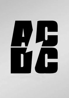 the letters are black and white with a lightning bolt in the middle, as well as an ac dc logo