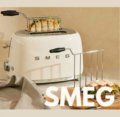 an advertisement for smeg toasters with the words smeg in front of it