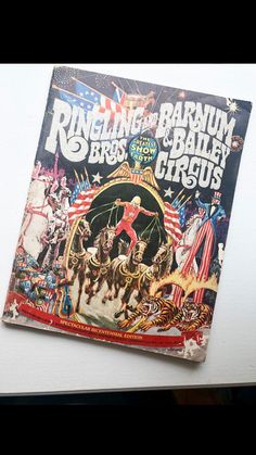 an old circus poster is hanging on the wall