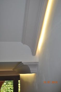 the light is on above the doorway in the house