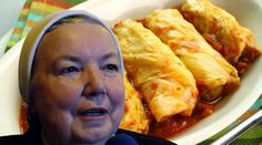 a woman with a head scarf on her head next to some food in a bowl