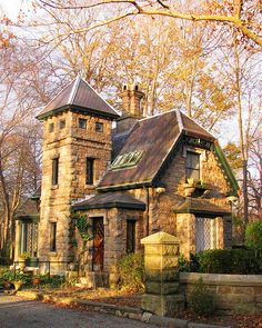 an old stone house in the fall