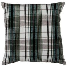 a green and white plaid pillow on a white background