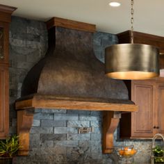 a kitchen with an oven, sink and counter tops in it's center island