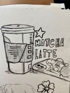 a drawing of a coffee cup and some food