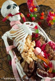 a skeleton with candy and candies in it