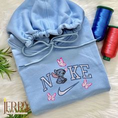 Cute Stitch Disney Nike Embroidered Sweatshirt & Hoodies: Adorable Matching Apparel for Disney Fans Blue Disney Sweatshirt, Cheap Character Print Sweatshirt For Fans, Disney Sweatshirt Jackets, Hand Embroidered Sweatshirt Nike, Cheap Embroidered Fan Merchandise Tops, Nike Hand Embroidered Sweatshirt, Embroider Nike Sweathshirt Pink, Hand Embroidered Sweatshirt Disney, Cheap Fan Merchandise Sweatshirt With Character Print