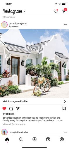 an instagram page with a photo of a white house and bicycle parked in front