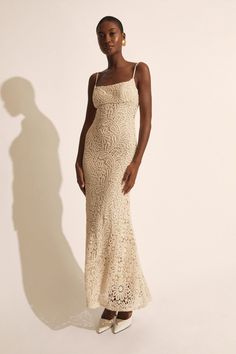 The Adoni Crochet Midi Dress is a textural, crochet design in a form-flattering silhouette with slim straps, a subtle scoop neckline and a softly flared hem. Finish with a neutral heel for a sophisticated look.

SIZING: True to size AU:.Model wears a size 8 / US: Model wears a size 4.

FABRICATION: Main: 100% cotton. Lining: 100% polyester. Exclusive of trims.

- Crochet detailing
- Slim straps
- Soft kick flare hem
- Scoop neckline
- Fully lined Crochet Dresses For Women, Corsets Fashion, Mum Jeans, Crochet Midi Dress, Crochet Midi, Day To Night Dresses, White Cocktail Dress, Crochet Dresses, Crochet Design