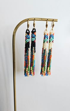 **Handwoven with the  Miyuki Round beads.** **Earwires are surgical steel.** **Each earring 8 cm long and weighs  4g.** **Please keep your earrings away from water, chemicals, and perfume.** **10% OFF 2 ITEMS FROM THE SHOP.** **Thanks for looking! Be sure to check out my other jewelry: serhatbeads.etsy.com** **If you have any questions, please feel free to contact me.** Tassel Beaded Earrings, Unique Adjustable Beaded Earrings With Dangling Beads, Artisan Earrings With Colorful Beads And Adjustable Fit, Artisan Adjustable Earrings With Colorful Beads, Bohemian Earrings With Tiny Beads And Adjustable Fit, Artisan Adjustable Beaded Earrings With Tiny Beads, Adjustable Multicolor Beaded Earrings, Gift Handwoven Adjustable Beaded Earrings, Adjustable Multicolor Beaded Earrings With Ear Wire