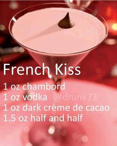 there is a pink drink with a spoon in it and the words, french kiss