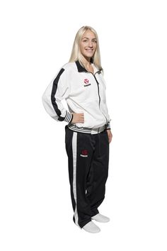 Warming up and waiting for competition during tournaments. This karate tracksuit by #hayashi makes a cool statement, provider comfortable fit and keeps joints and muscles warm. #womenfighter White Jacket Black Pants, Karate Kumite, Highlights Red, White Highlights, Warming Up, Tracksuit Women, White Jacket