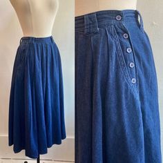 "This is a great full skirt with some nice style details. It's hard not to notice the side buttons which are functionally but also really cute. Has deep pockets and belt loops which really add to the styling options. Just enough fabric volume to swish around in and a side vent for ease of walking.  Fabric is denim-like and not heavy. More like a dark chambray.  Label is R (Roper). Definitely a Western wear piece. Condition is Great. Original size is 5/6. Please see measurements (all flat) 12.5 waist / free hip / 25\" length I'm always happy to provide more information - just send a message! ~~Condition Guide ~~ Mint: Perfect. Possibly never worn. Great: Little visible wear, lightly worn. Very Good: normal wear for the age.  Good: A few visible flaws but construction is sound and item is we