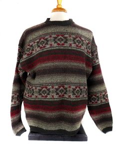 Vintage men's wool sweater by Woolrich in size L; 1990's. Various shades of grey, brown, beige and maroon in an all over Navaho design. Measurements: Chest - 23.5" (armpit to armpit, laid flat) Length - 26" Sleeves - 21.5" Width at hemline - 21" (seam to seam laid flat) Excellent pre-owned, gently used condition. Please refer to all photos. *To avoid inconvenient returns, please refer to all pictures and all measurements. If you need any more measurements,  pictures, or information, please feel 1990s Clothes, Vintage Grandpa Sweater, Vintage Long Sleeve Brown Sweater, 70s Wool Sweater, Retro Brown Wool Sweater, Vintage Sweaters 90s Men, Vintage Brown Striped Sweater, Cowichan Sweater, Wool Sweater Men