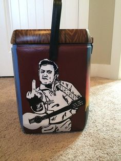 a bag with a drawing of a man holding a guitar