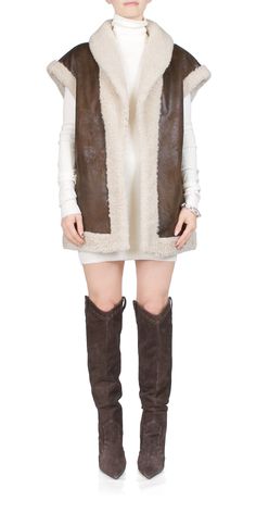 Luxury Faux Fur Vest, Faux Fur Coat Vest, Luxury Sheepskin Women's Vest, Luxury Classic Vest, Luxury Brown Vest With Pockets, Luxury Sleeveless Outerwear For Fall, Luxury Winter Vest For Workwear, Luxury Winter Workwear Vest, Elegant Brown Winter Vest