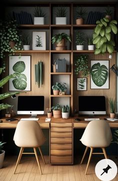 a desk with two computers and plants on it