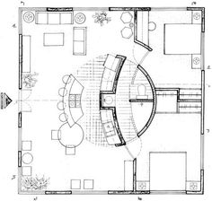 the floor plan for a living room and dining area, with furniture arranged around it