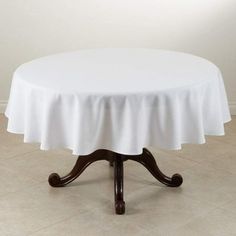 a round table with a white cloth on it