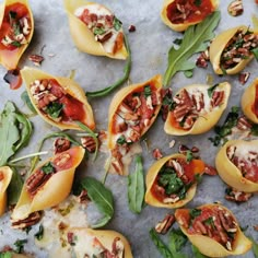 small stuffed shells filled with meat and veggies on top of a sheet of paper