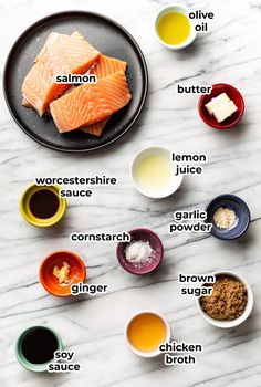 the ingredients for salmon on a marble table