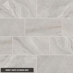 white marble tile with the words grout maps warm gray