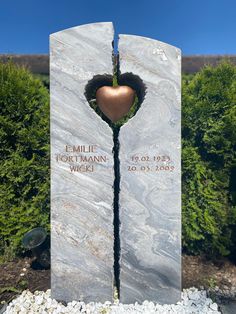 a memorial with an apple in the center