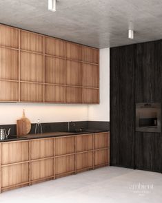 an empty kitchen with wooden cabinets and black counter tops