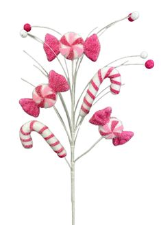 pink and white candy canes on top of each other in the shape of hearts