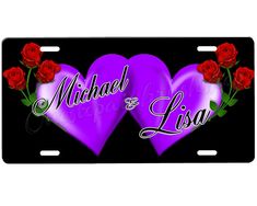 two purple hearts with roses on them and the words michael & leia written in white