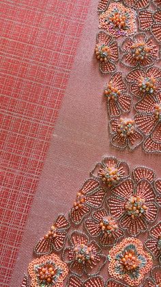 two pieces of fabric with crochet work on them, one is red and the other is pink